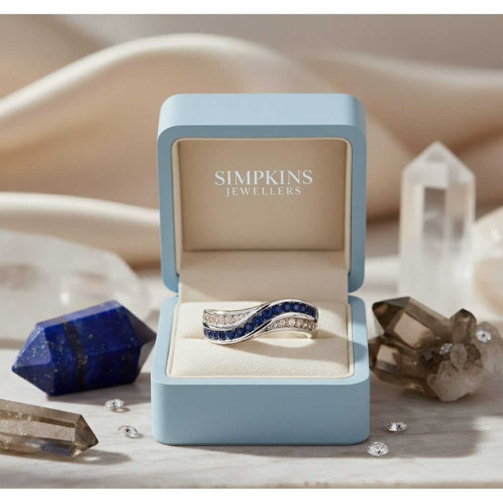 9ct White Gold Sapphire & 0.14ct Diamond Crossover Ring DSR854WIT